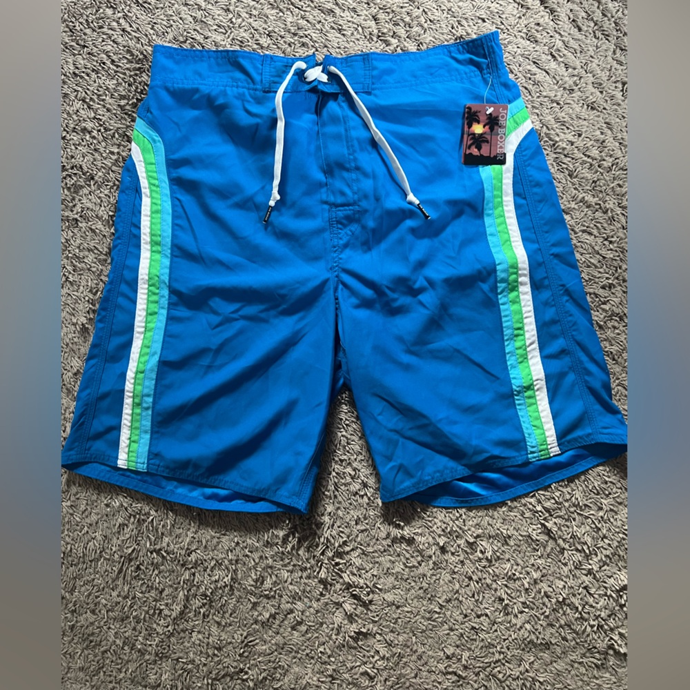 NWT Joe Boxer Blue Swim Shorts with Green and white Stripes. Size L.